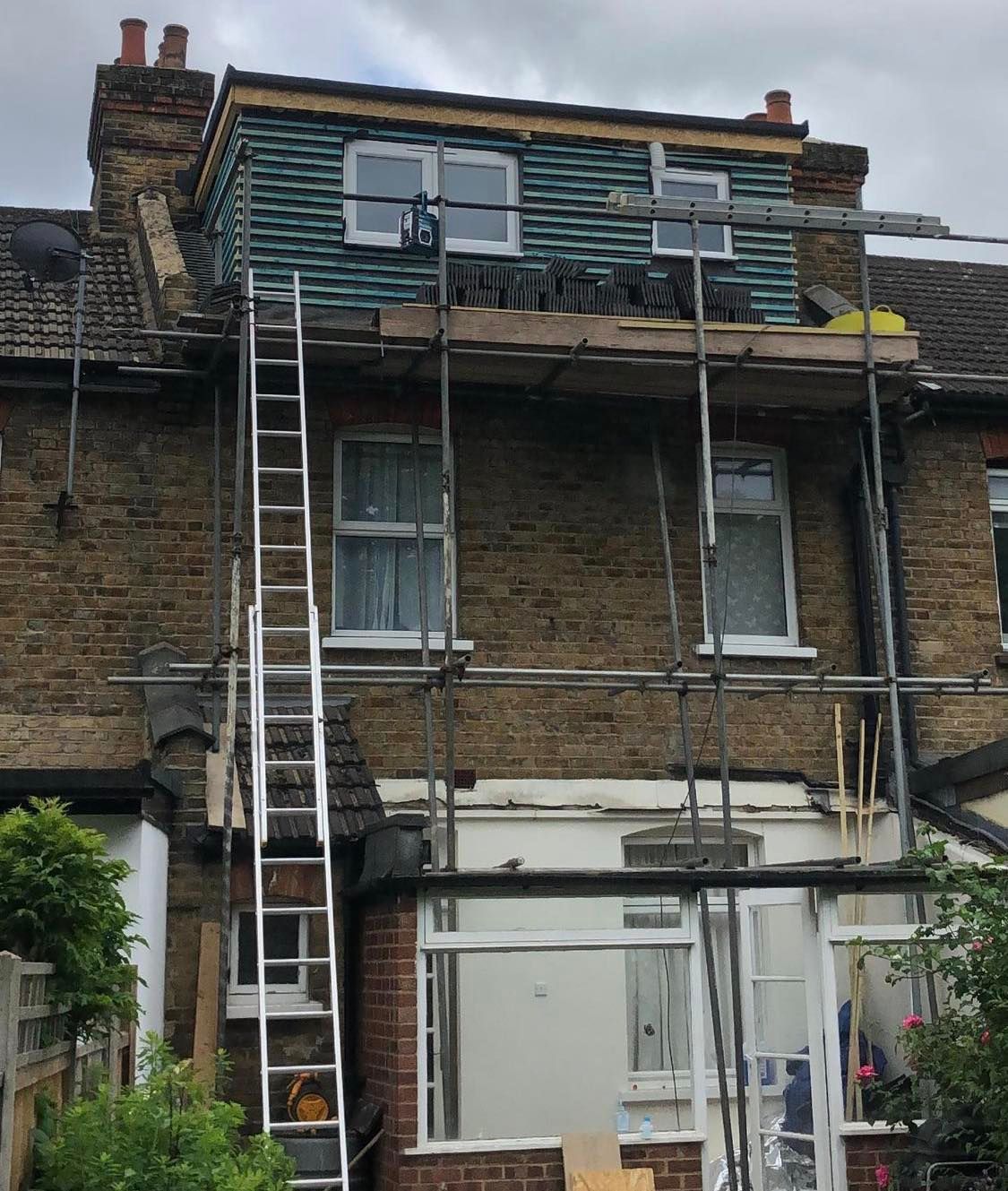 Dormer loft conversion getting new cladding installed on the exterior