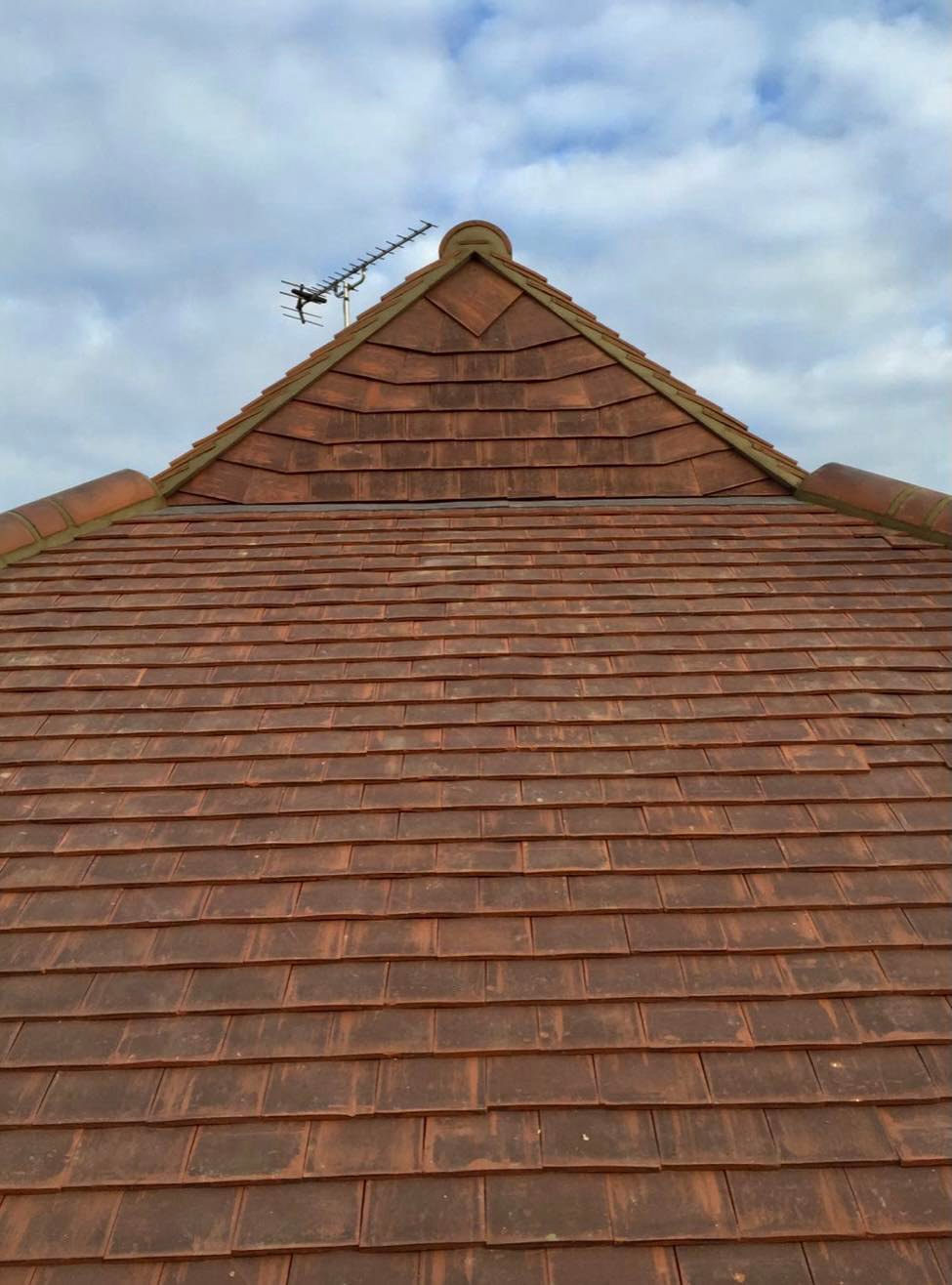 New tiles installed on a damaged roof