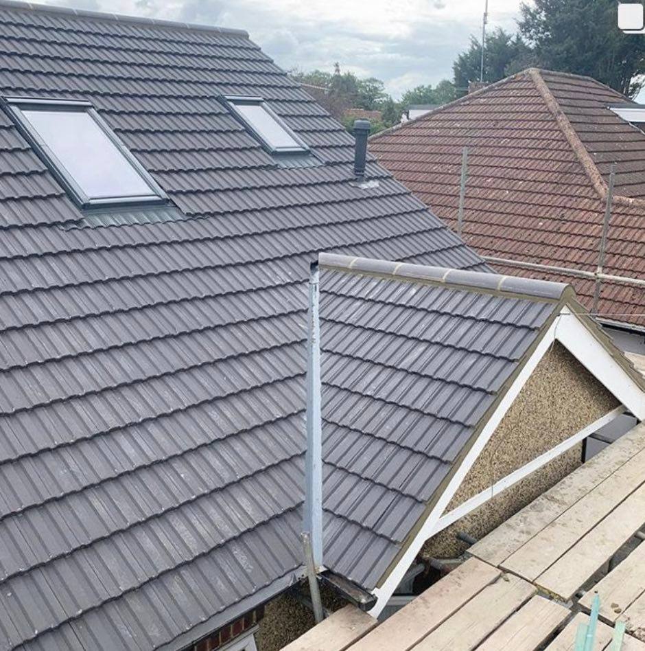 New tiles installed on a pitched roof