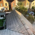 An aerial view of a new roof that has been re-tiled.